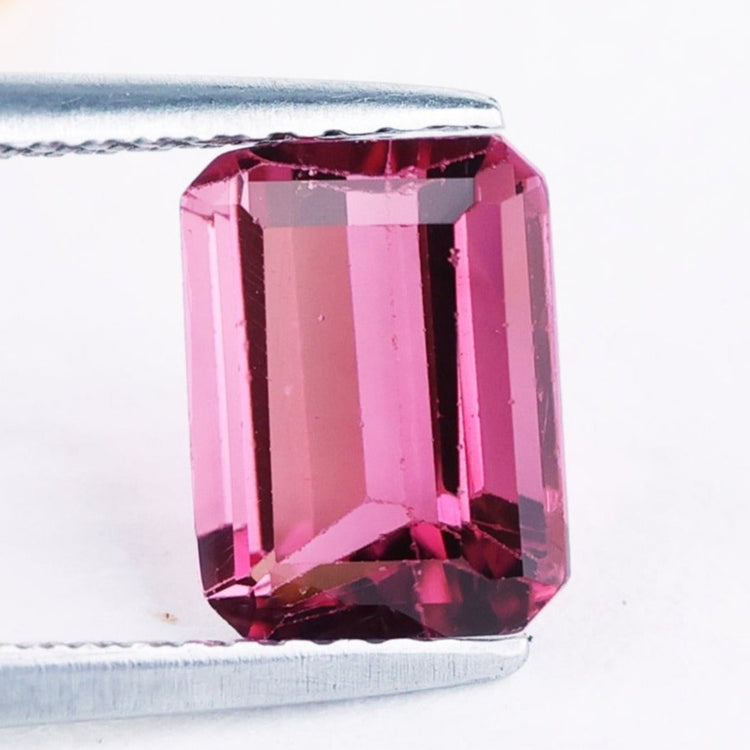 Emerald cut gemstone pink tourmaline gemstone.
