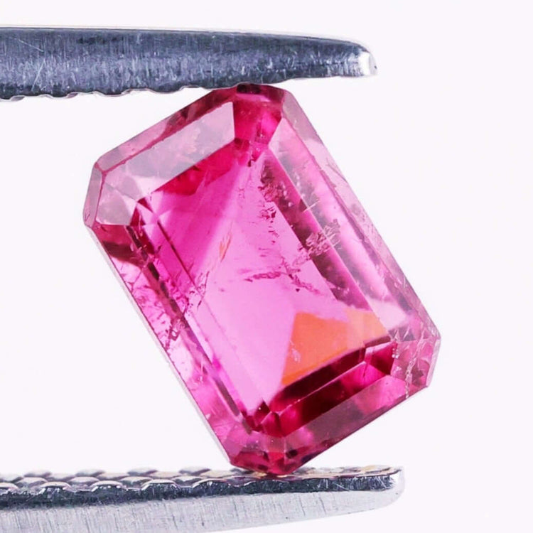Tourmaline gemstone with emerald cut pink tourmaline.
