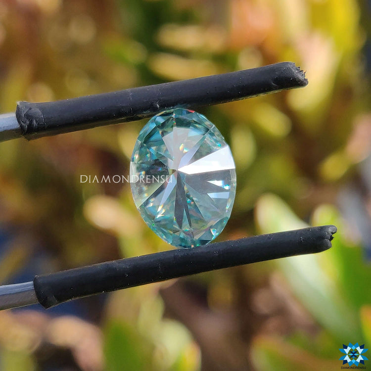 Cyan blue moissanite offered in oval cut moissanite and moissanite loose stone format.
