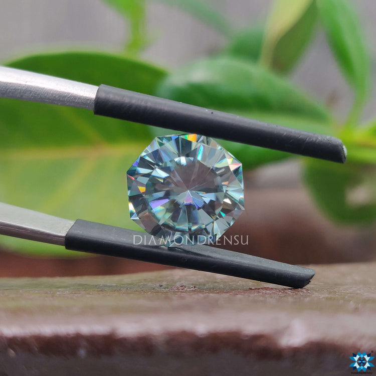 Loose moissanite stone paired with octagon moissanite design.
