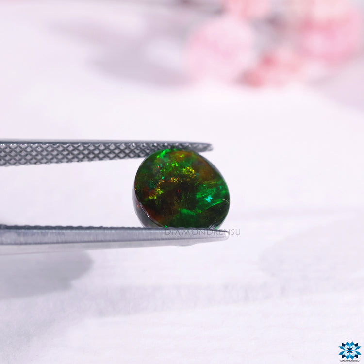 Ethiopian opal with 1.88 carat weight shown as October birthstone opal in oval shape.
