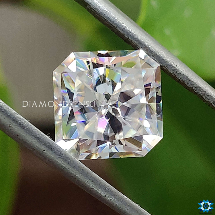 2.10 carat Moissanite featured in Moissanite Square Radiant Rensu Cut for statement earrings.