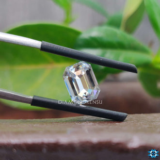Loose stone featured in emerald cut moissanite and 2.04 carat moissanite format.
