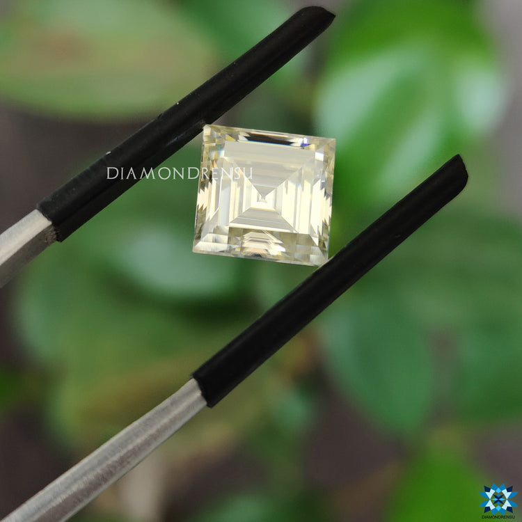 Moissanite antique cut reflecting off white moissanite glow.
