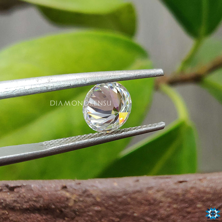 Round brilliant moissanite set in handcrafted pendants using moissanite loose stones.