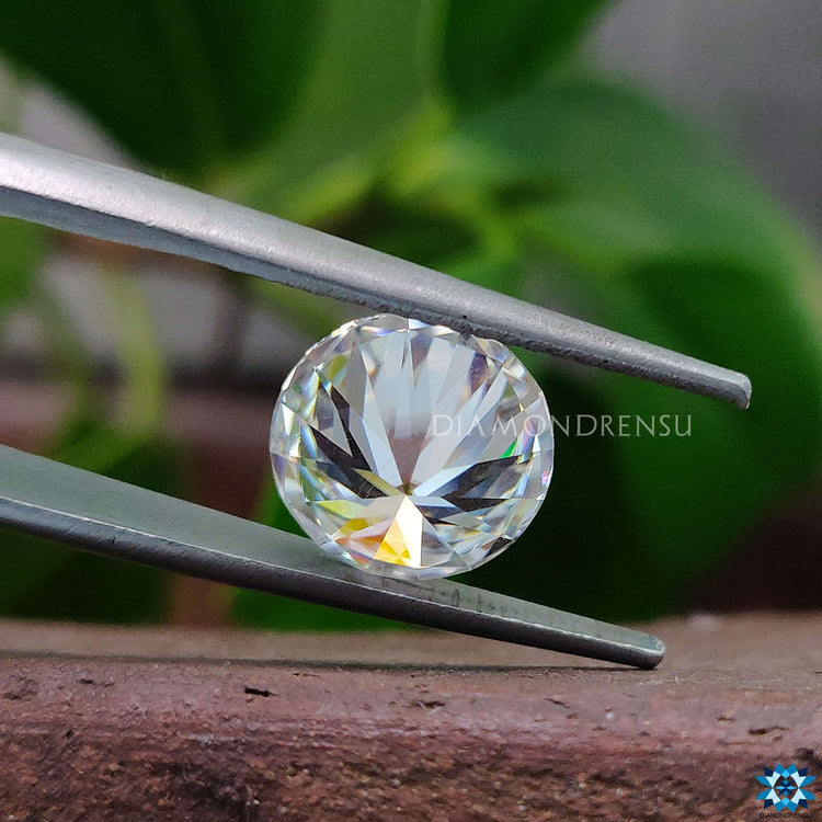 Round Hearts and Arrows Cut displayed as a single moissanite stone.
