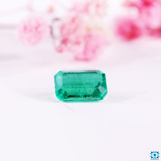 Emerald green gemstone presented as gemstone emerald.
