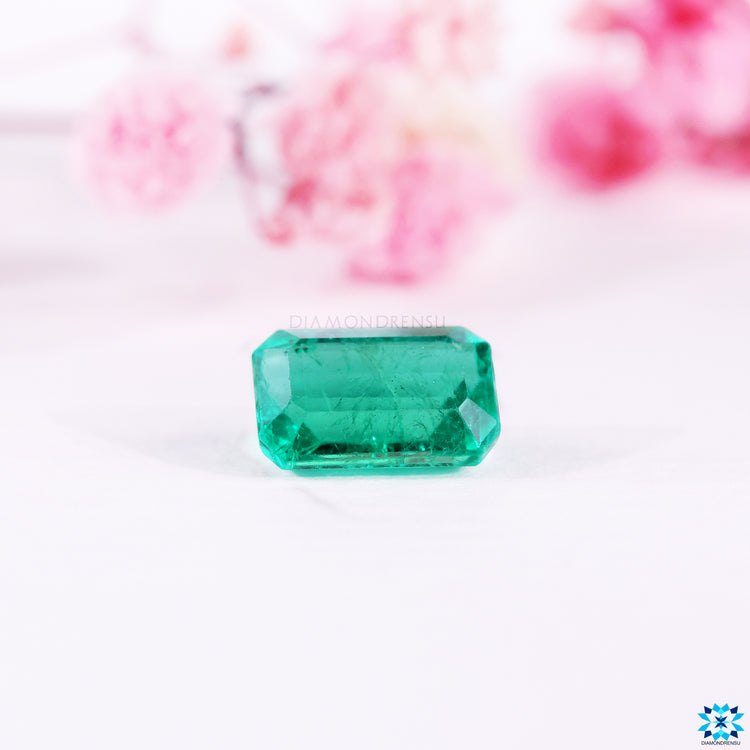 Emerald green gemstone presented as gemstone emerald.
