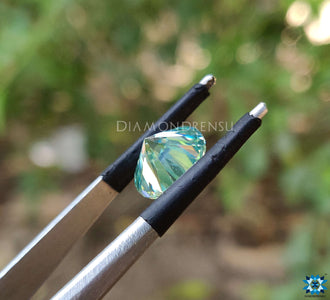 Cyan Blue round cut Moissanite shaped in 3.29 carat Moissanite for bridal bands.