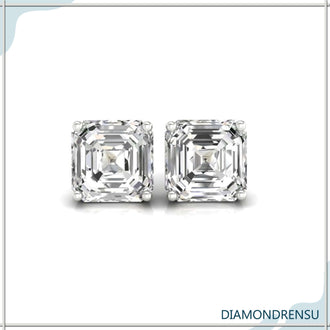 Exquisite diamond wedding earrings featuring asscher cut diamonds in a four prong setting.
