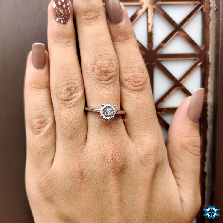 Radiant round brilliant ring with a flawless finish.
