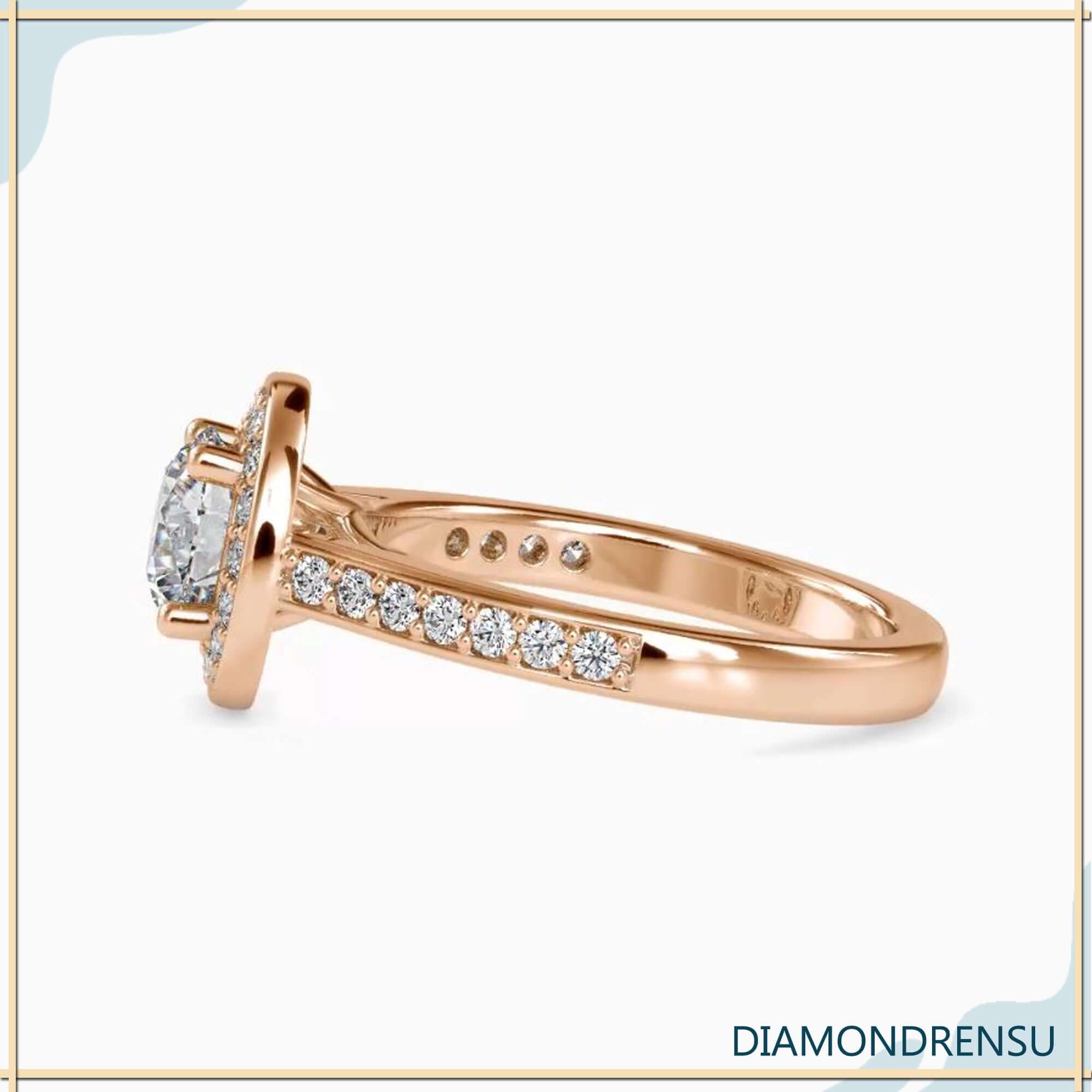 Classic gold halo ring with a round diamond halo setting for timeless beauty.
