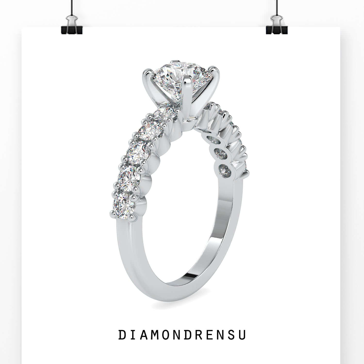 Gorgeous round 4 prong engagement ring with a pave band for extra brilliance.
