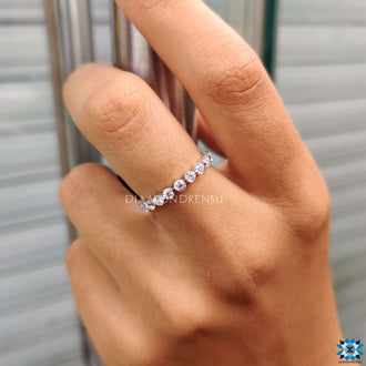 Classic moissanite band with shimmering gemstones perfect for any special occasion.