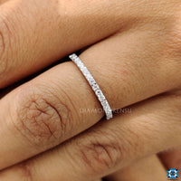 Stunning moissanite band with brilliant stones for a radiant finish on your finger.