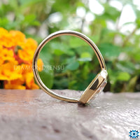 Engagement rings cushion cut style with a timeless bezel set, perfect for showcasing elegance.