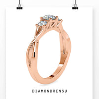 Elegant three stone engagement ring with an IGI certified diamond center.
