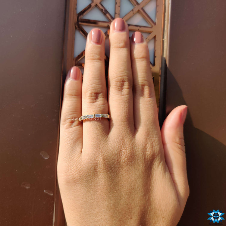 Bar set baguette wedding band with a chic, modern edge.