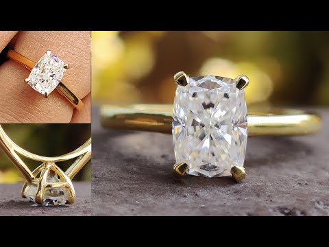 Handmade elongated cushion cut solitaire for a classic look.