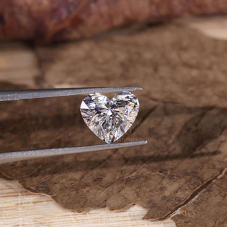 Buy a loose diamond with a beautiful heart shaped cut.
