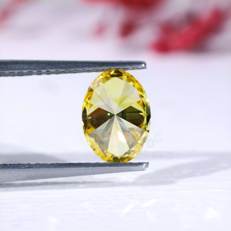 IGI certified loose diamond yellow oval cut.
