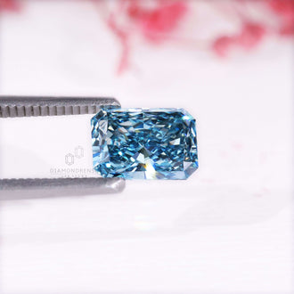 Lab grown fancy blue diamond loose radiant cut certified.
