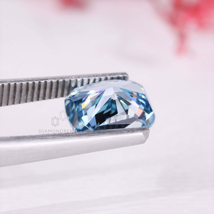 Fancy vivid blue diamond in elongated cushion cut shines with lab grown clarity.
