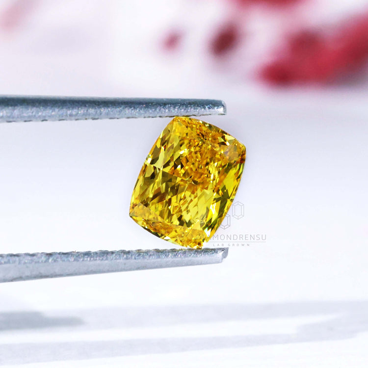 Loose elongated cushion cut yellow diamond lab grown.

