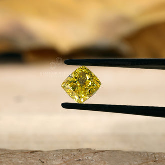 Yellow diamond cushion cut IGI certified.
