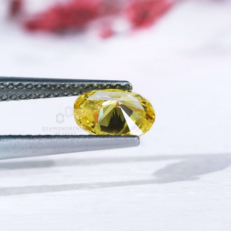 Buy loose lab grown oval yellow diamond 0.70 carat.
