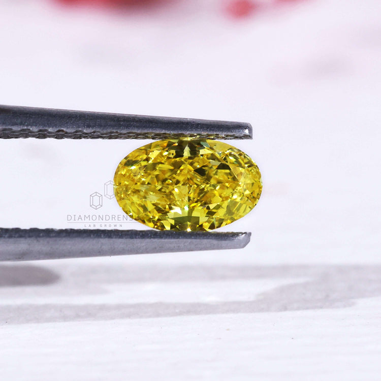 Oval cut loose diamond yellow lab grown 0.60 carat.

