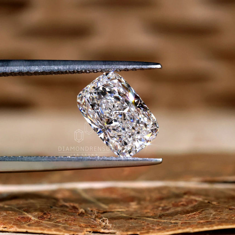 The elongated cushion lab diamond features a soft shape and 2 carat size.
