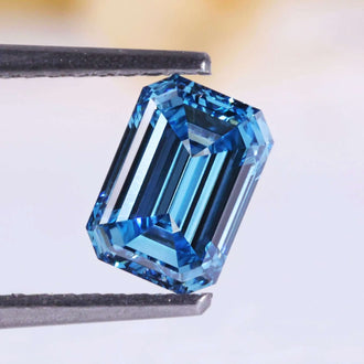 0.86 carat emerald cut lab grown blue diamond.
