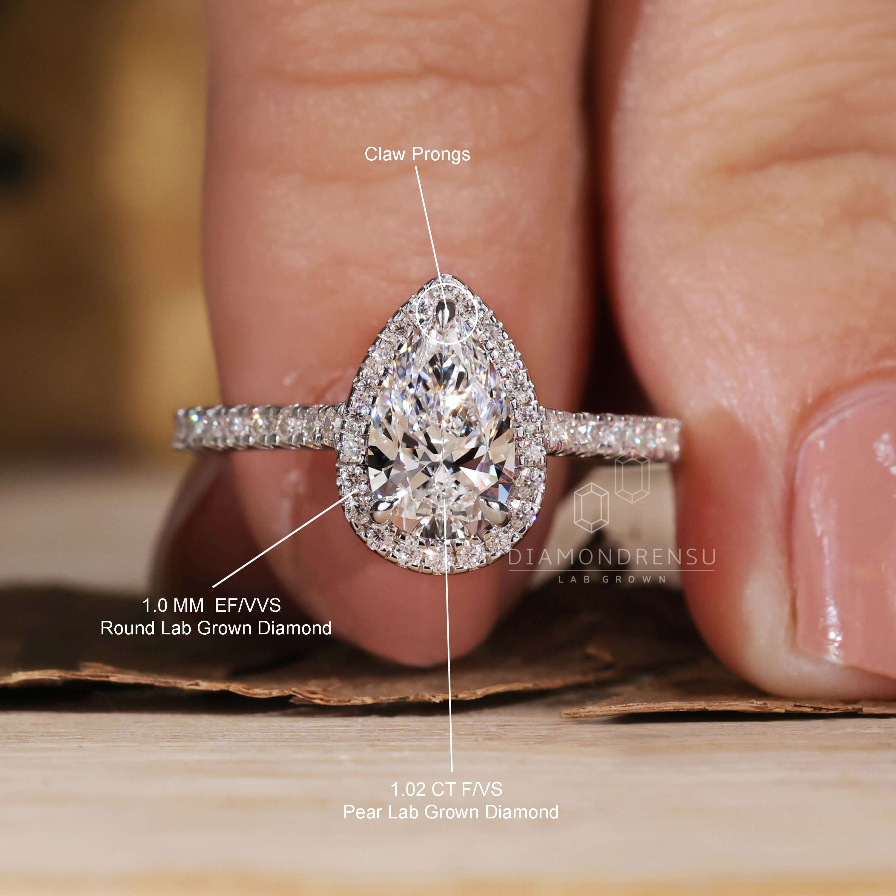 Incredible, Glamorous Pear Shaped Diamond Engagement Ring with Pave Halo | Pear  shaped diamond engagement rings, Engagement, Diamond engagement rings