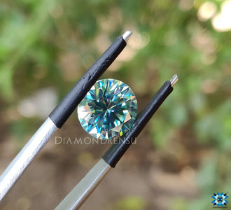 Cyan Blue round cut Moissanite shaped in 3.29 carat Moissanite for bridal bands.