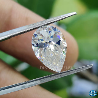 3 carat moissanite stone glowing with pear cut moissanite facets.
