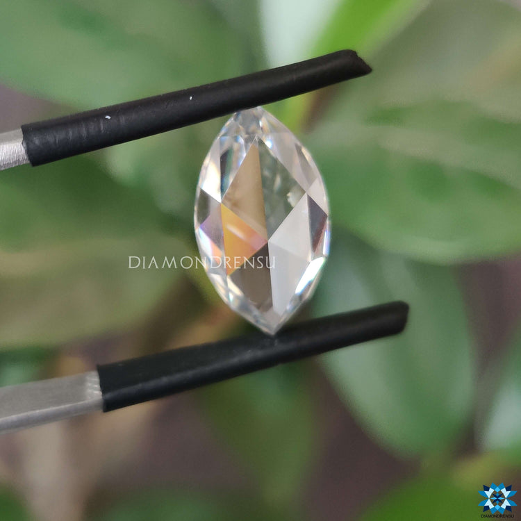 Marquise rose cut moissanite with antique cut moissanite sparkle.
