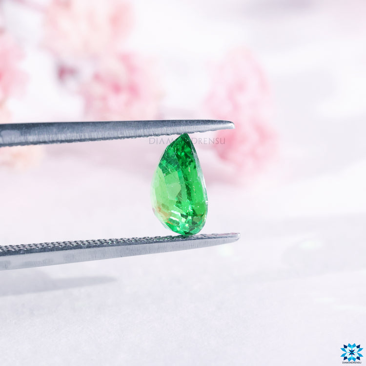 Green pear gemstone sold as pear shaped tsavorite and 1.18 carat pear gemstone.
