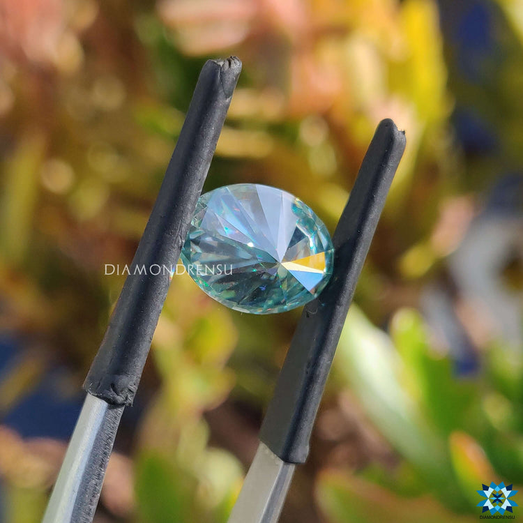 Oval cyan blue moissanite listed as 2.25 carat moissanite and loose moissanite.
