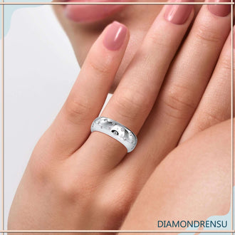 Gypsy band style round diamond eternity band in white gold
