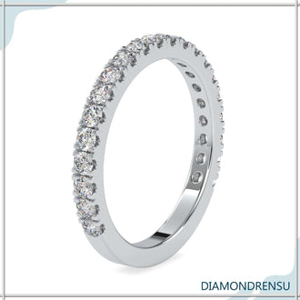 IGI certified semi eternity band with rounded diamonds and a pave wedding band design.
