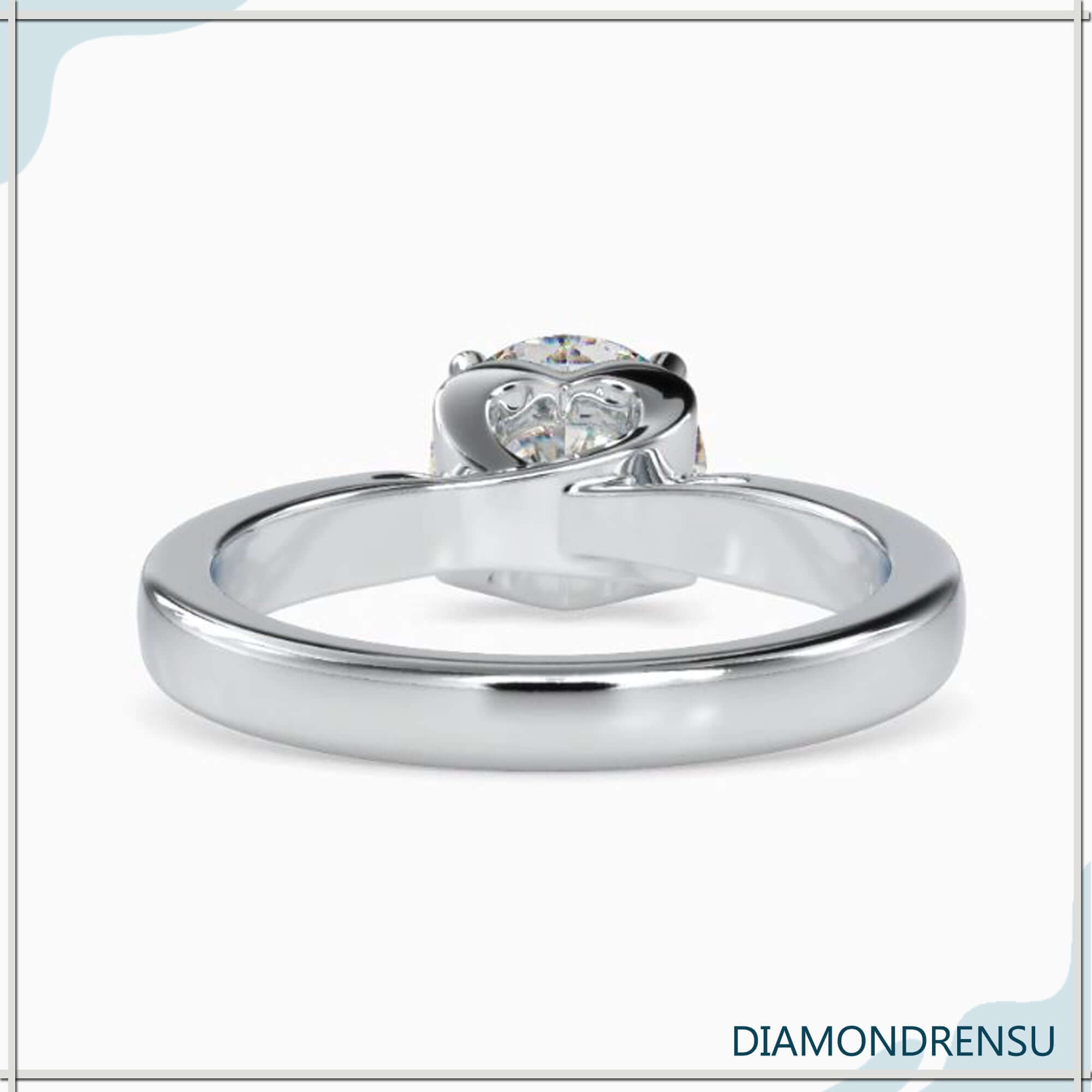 Cathedral diamond ring with lab grown round solitaire diamond.