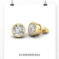Beautiful bezel diamond stud earrings, designed with handmade jewelry craftsmanship.
