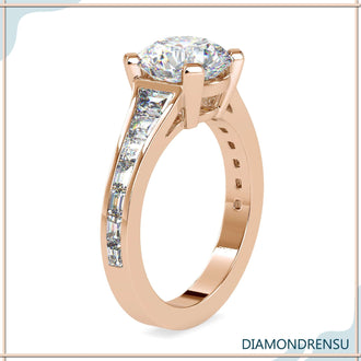 Classic tapered pave ring with a round diamond and pavé setting for extra sparkle.