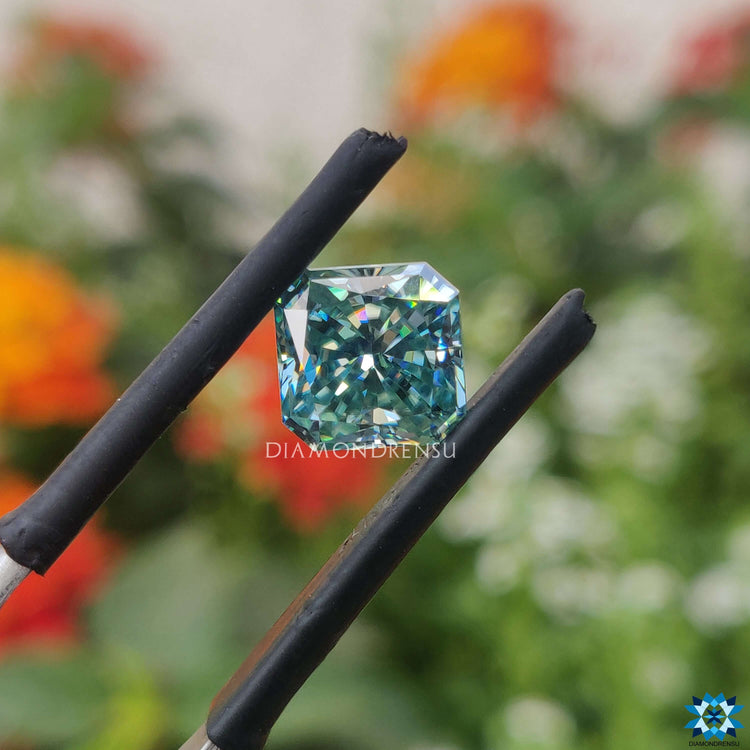 Loose moissanite available as radiant cut and cyan blue moissanite.
