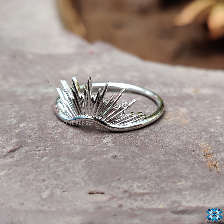 Curved antique wedding band with intricate detailing for vintage 
charm.