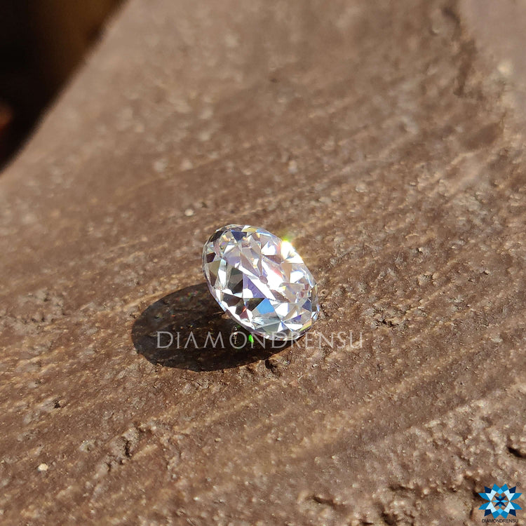 Loose moissanite in round old European cut with antique details and clear appearance.

