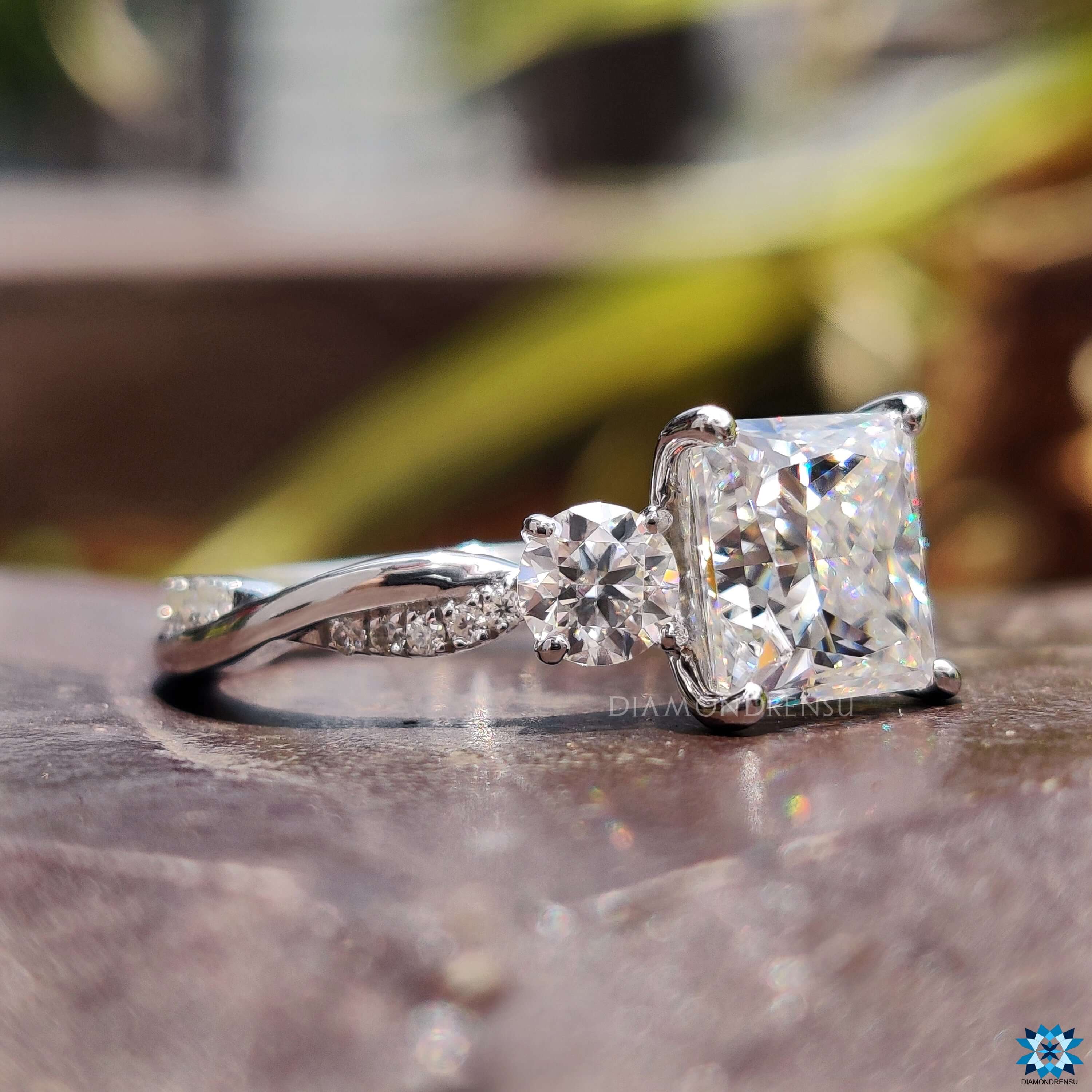 twisted pave set moissanite engagement ring