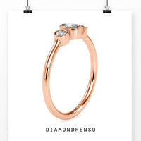 Three stone diamond ring with side stones and lab grown diamonds
