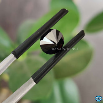 Moissanite round brilliant cut shining on moissanite loose stone.
